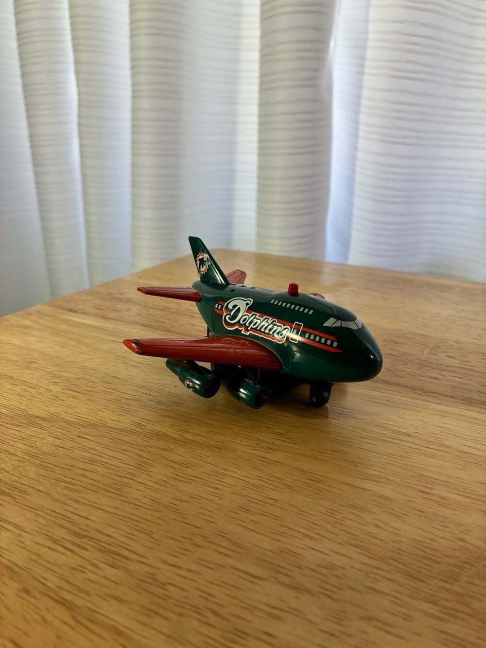 Miami Dolphins NFL Press Pass Pullback Toy Airplane with Light and Sound